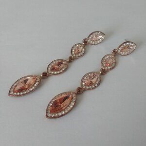 Long dangle earrings pink stones rose gold tone halo